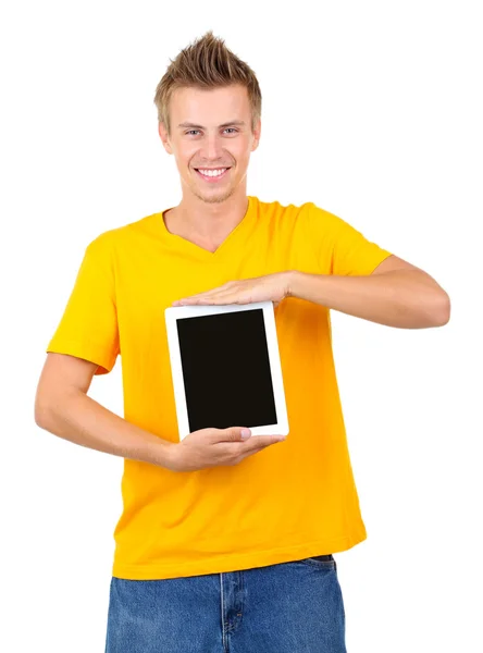 Yakışıklı bir delikanlı ile üzerine beyaz izole tablet — Stok fotoğraf