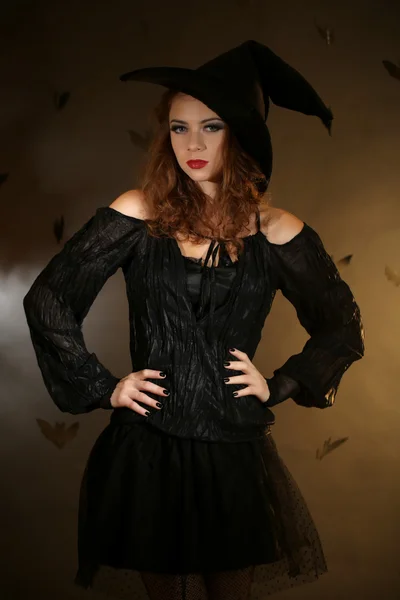 Halloween witch on dark background — Stock Photo, Image