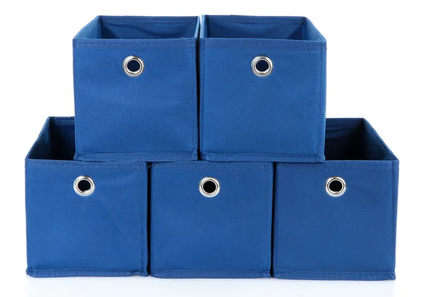 Cajas textiles azules aisladas en blanco — Foto de Stock