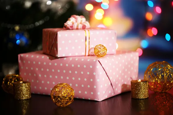 Many gifts on bright background — Stock Photo, Image