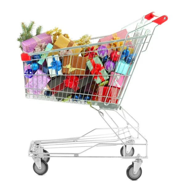 Christmas gifts in shopping trolley, isolated on white — Stock Photo, Image