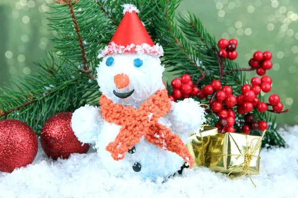 Beautiful snowman and Christmas decor, on bright background — Stock Photo, Image