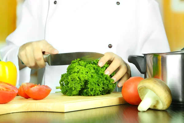 Cook hands cutting parsley — Stock Photo, Image