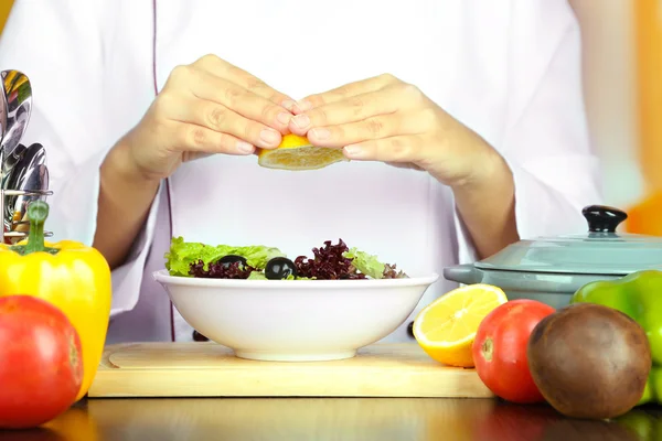 Cook hands prepare salad — Stock Photo, Image