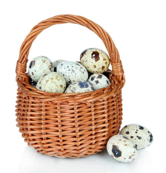 Quail eggs in wicker basket isolated on white — Stock Photo, Image