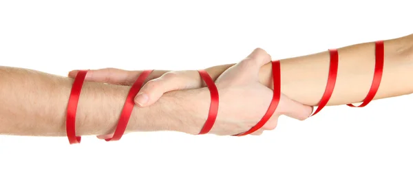 Mans and girls hands tied with ribbon isolated on white — Stock Photo, Image