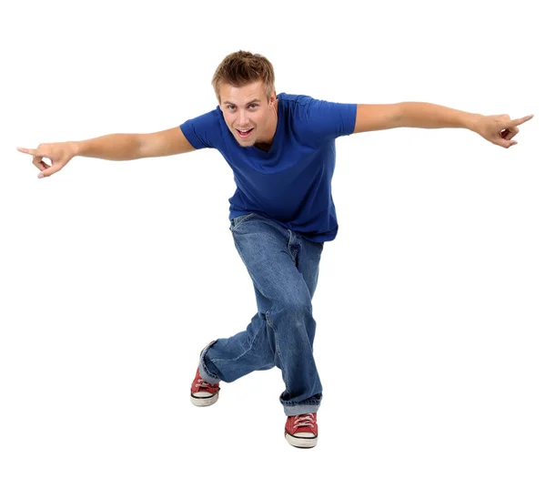 Pohledný mladý muž tančí izolované na bílém — Stock fotografie