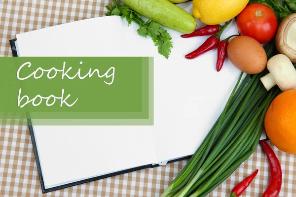 Concepto de cocina. Abarrotes con libro de cocina vacío de cerca — Foto de Stock