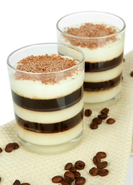 Café geleia saboroso com leite na mesa no fundo branco — Fotografia de Stock