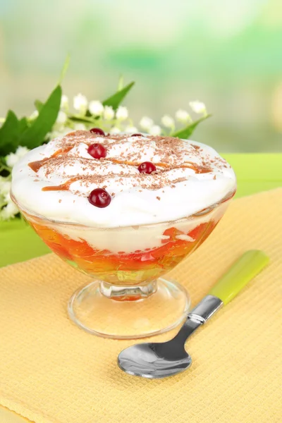 Tasty jelly in bowl on table on light background — Stock Photo, Image