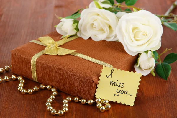 Romantic parcel on wooden background — Stock Photo, Image