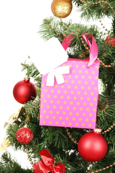 Regalo en árbol de Navidad aislado en blanco — Foto de Stock