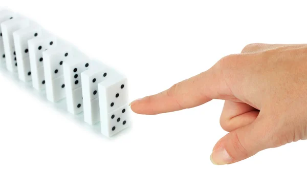 Mano spingendo domino isolato su bianco — Foto Stock