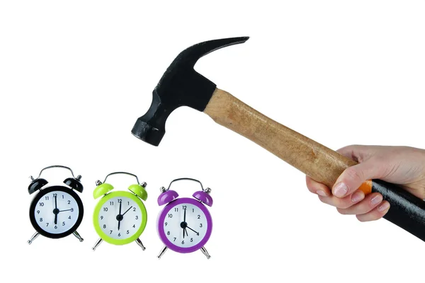 Hammer in hand and alarm clocks isolated on white — Stock Photo, Image