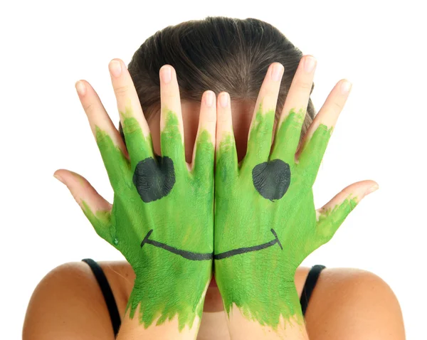 Portrait of girl hiding her face under smile mask isolated on white — Stock Photo, Image