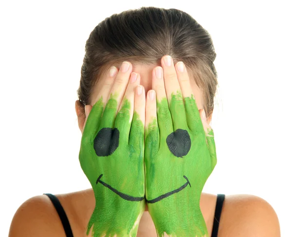 Portrait of girl hiding her face under smile mask isolated on white — Stock Photo, Image