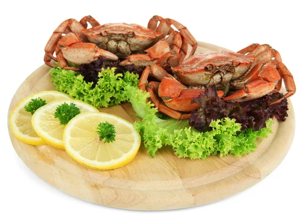 Boiled crabs on wooden board, isolated on white — Stock Photo, Image