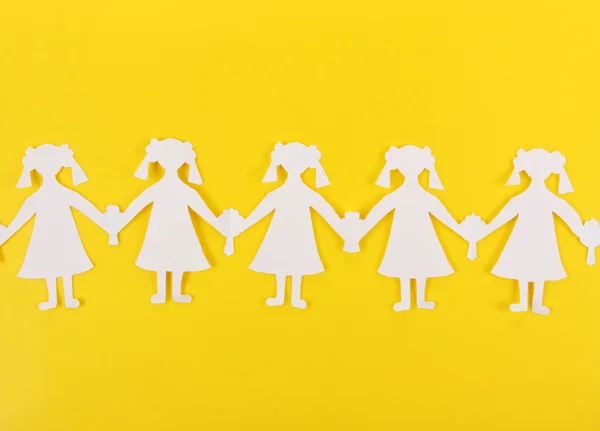 Paper people in social network concept on yellow background — Stock Photo, Image