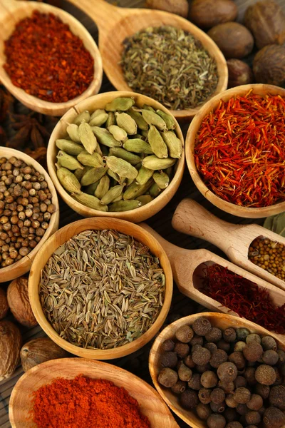 Many different spices and fragrant herbs close-up background — Stock Photo, Image