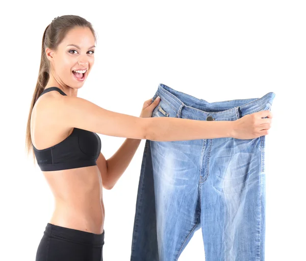Slim girl with big jeans — Stock Photo, Image