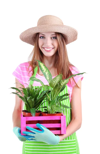 Hermosa chica jardinero con flores aisladas en blanco —  Fotos de Stock