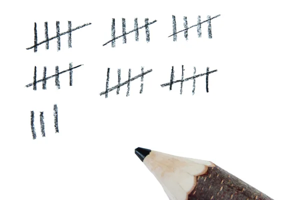 Counting days by drawing sticks — Stock Photo, Image