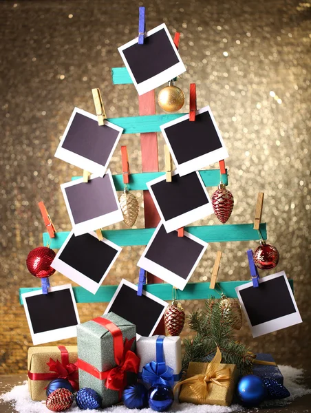 Fir tree with empty photo paper and Christmas decor — Stock Photo, Image