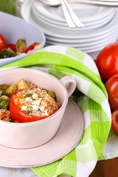 Stuffed tomatoes in pan on wooden table close-up — Stock Photo, Image