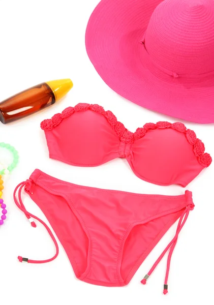 Swimsuit and beach items isolated on white — Stock Photo, Image