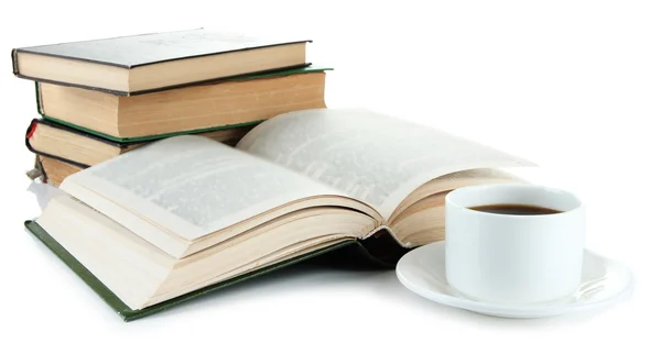 Taza de café y libros aislados en blanco — Foto de Stock