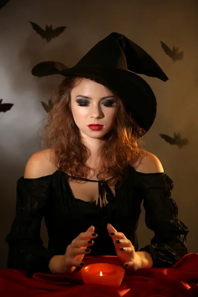 Halloween witch on dark background — Stock Photo, Image