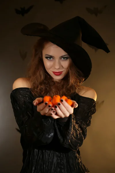 Halloween witch on dark background — Stock Photo, Image