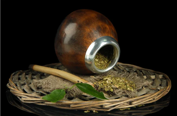 Calabash and bombilla with yerba mate isolated on black — Stock Photo, Image