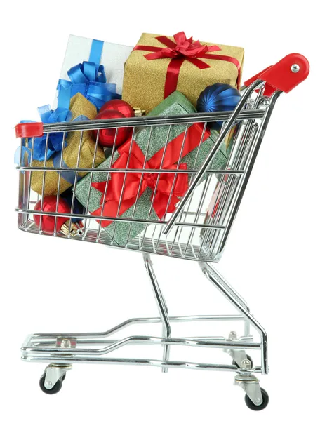 Christmas gifts in shopping trolley, isolated on white — Stock Photo, Image