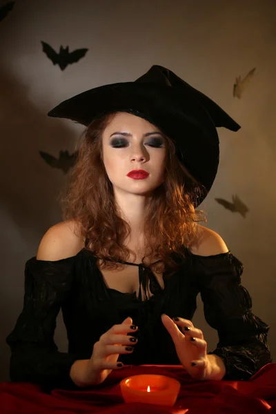 Halloween witch on dark background — Stock Photo, Image