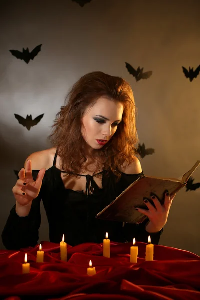 Halloween witch on dark background — Stock Photo, Image