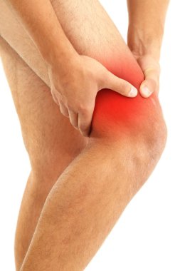diz ağrısı, üzerinde beyaz izole genç adamla