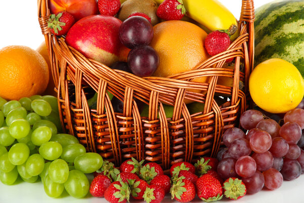 Different fruits on white background