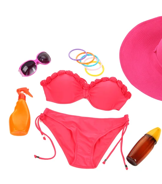 Swimsuit and beach items isolated on white — Stock Photo, Image