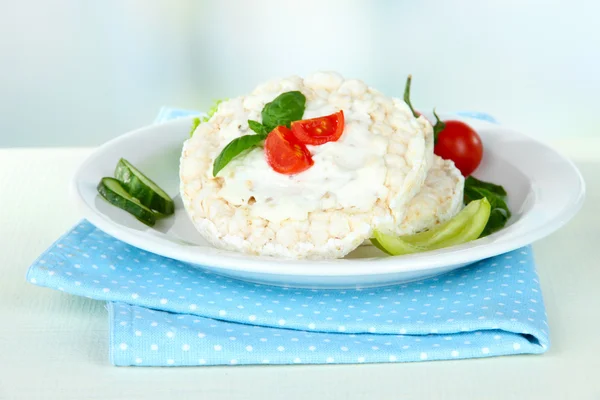 Tasty crispbreads with vegetables on white table — Stock Photo, Image