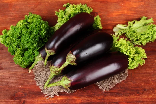 Fresh eggplants on table close-up — Stock Photo, Image