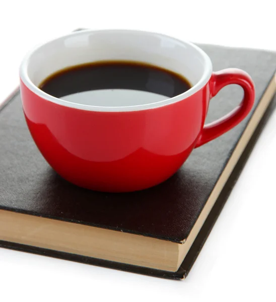 Taza de café en libro aislado en blanco — Foto de Stock