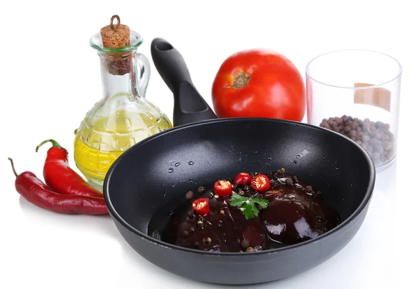 Raw liver in pan with spices and condiments isolated on white — Stock Photo, Image