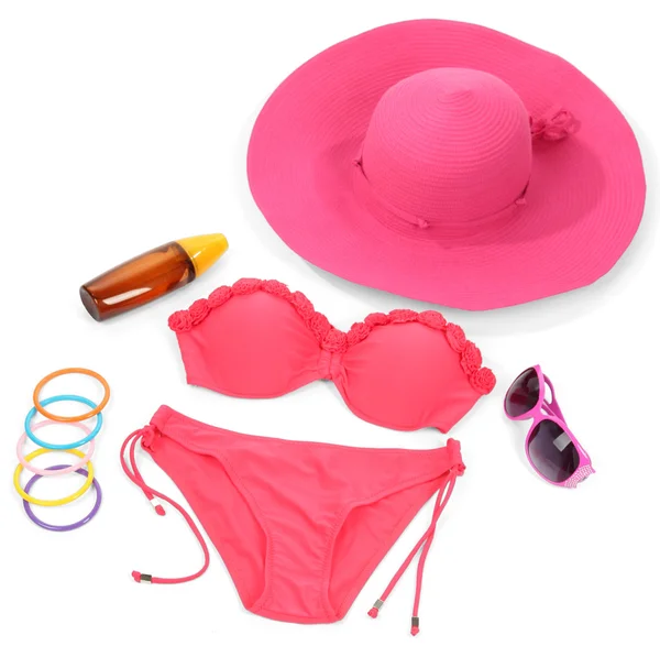 Swimsuit and beach items isolated on white — Stock Photo, Image