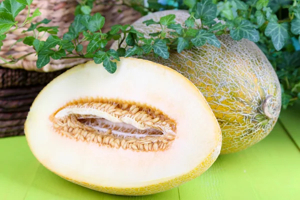 Ripe melons on wooden table close-up — Stock Photo, Image
