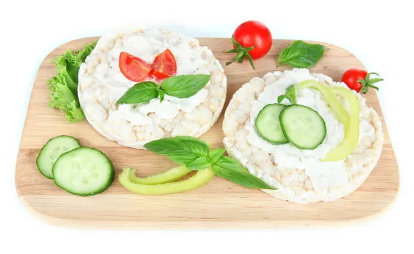 Des pains croustillants savoureux aux légumes, isolés sur du blanc — Photo