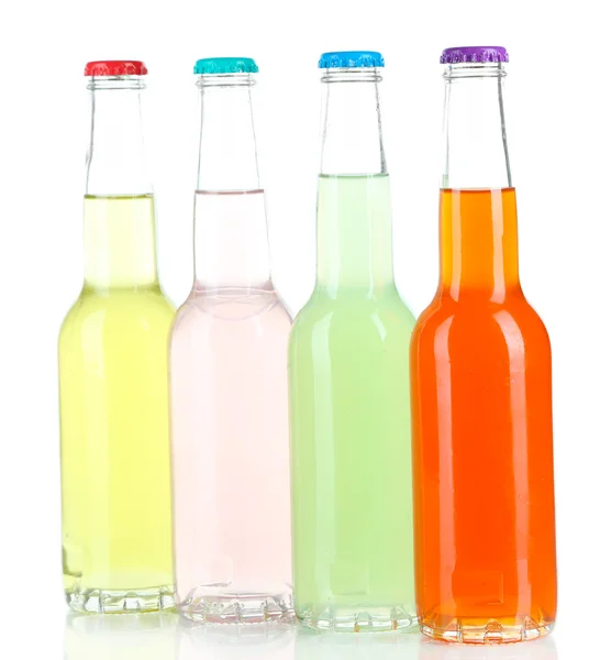 Bebidas em garrafas de vidro isoladas em branco — Fotografia de Stock