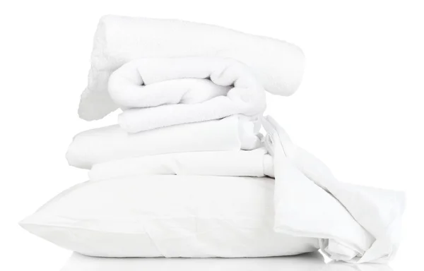 Stack of rumpled bedding sheets isolated on white — Stock Photo, Image