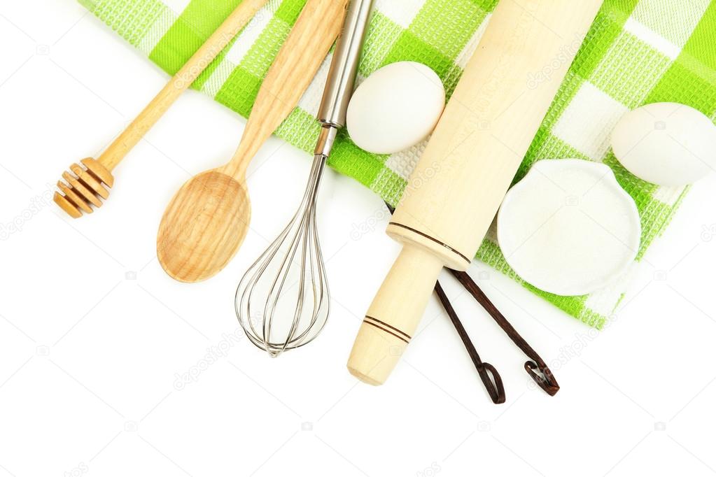 Cooking concept. Basic baking ingredients and kitchen tools isolated on white