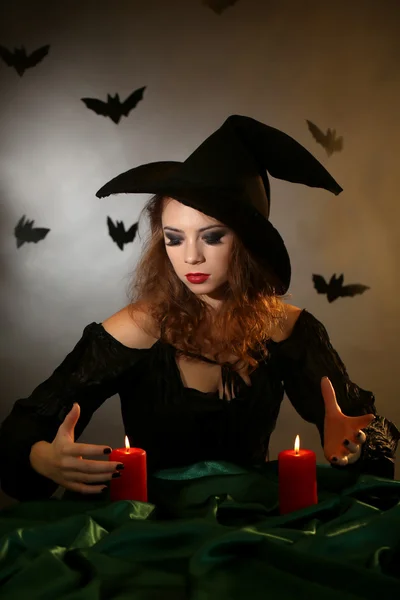 Halloween witch on dark background — Stock Photo, Image